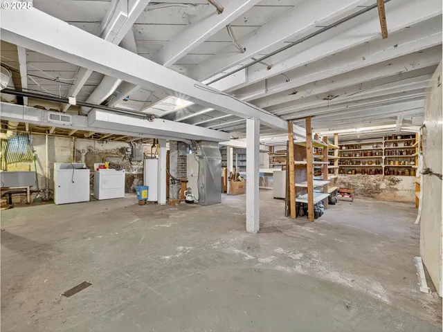 a view of a room with wooden ceiling