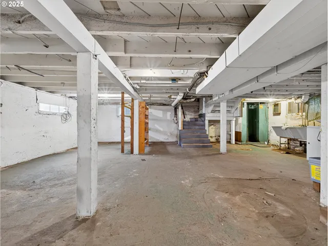 a view of a room with wooden walls