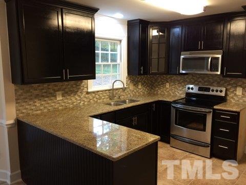 7705 Hilburn Drive Raleigh, NC 27613 - Photo 3 of 16