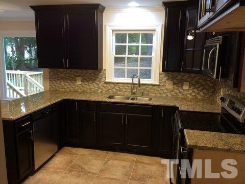 7705 Hilburn Drive Raleigh, NC 27613 - Photo 4 of 16