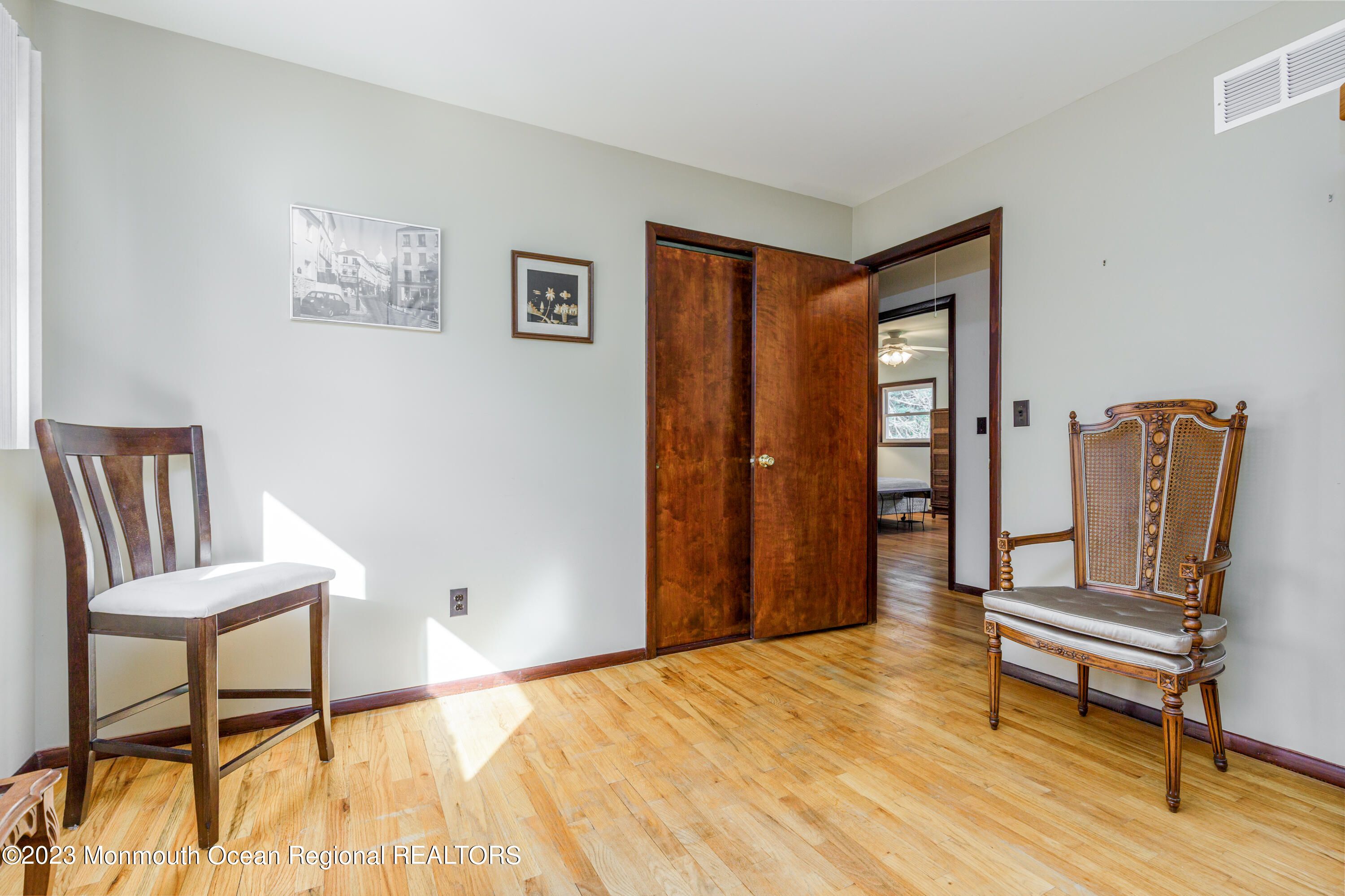18 Forman Road Millstone Township, NJ 08535 - Photo 29 of 57 a living room with furniture and a wooden floor