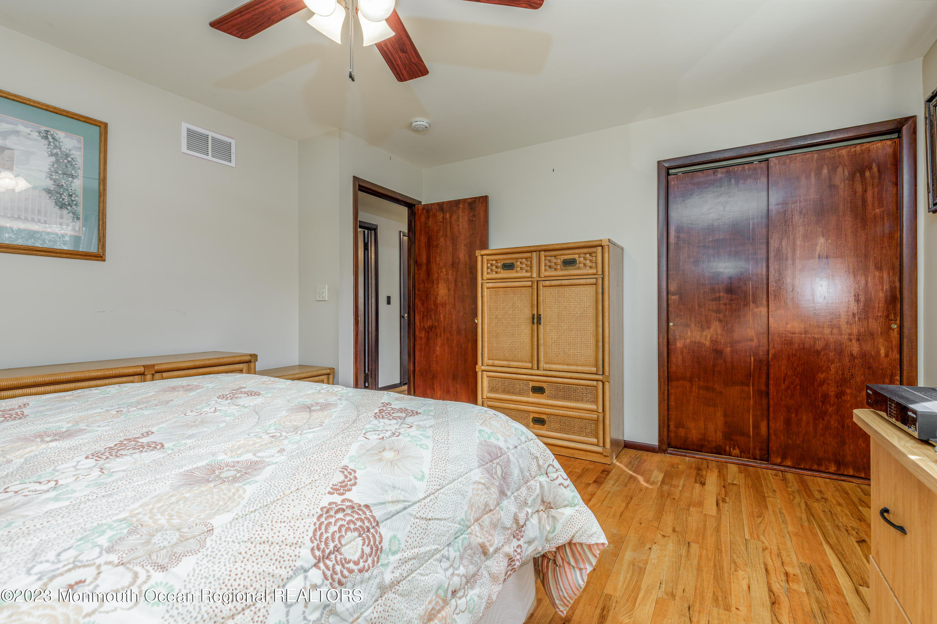 18 Forman Road Millstone Township, NJ 08535 - Photo 31 of 57 a bedroom with a bed and a dresser