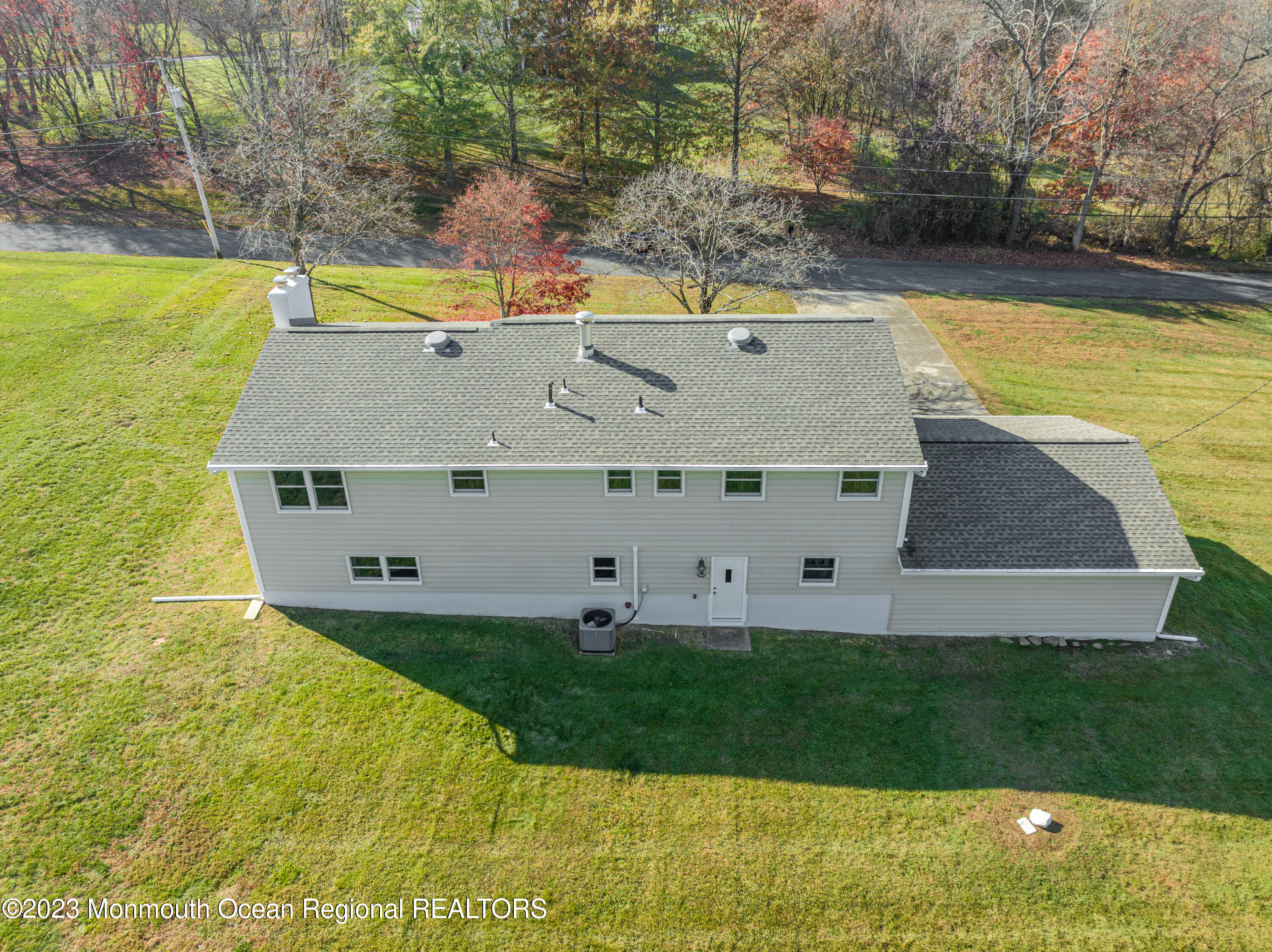 18 Forman Road Millstone Township, NJ 08535 - Photo 42 of 57 an aerial view of a house with a yard