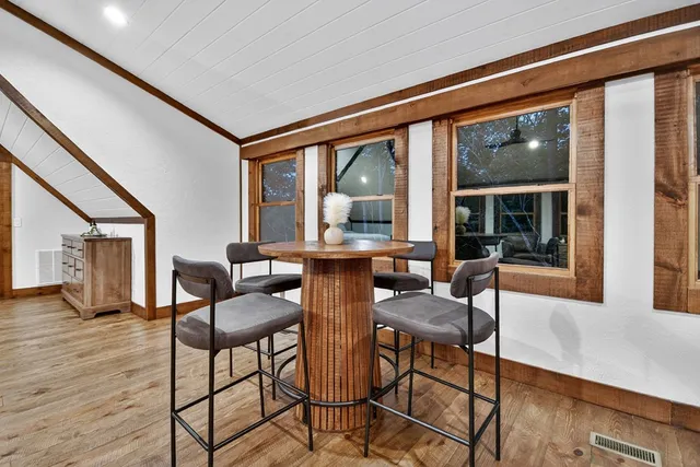 a kitchen with stainless steel appliances granite countertop a stove and a refrigerator