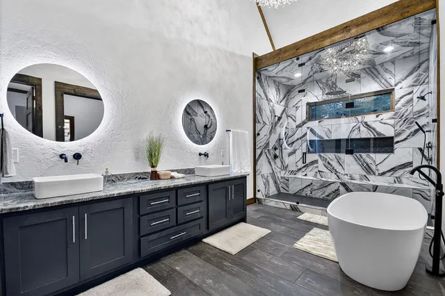 a kitchen with a refrigerator and cabinets