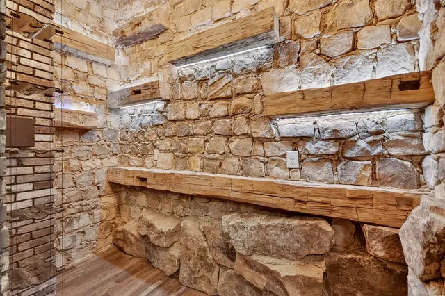 a living room with furniture and windows