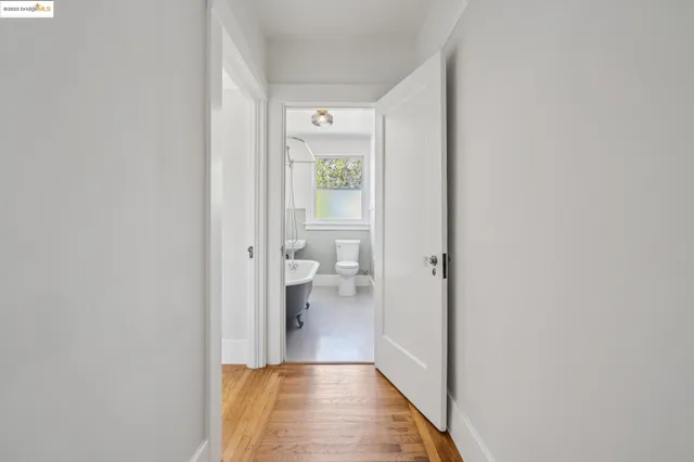 a view of a bathroom from the hallway