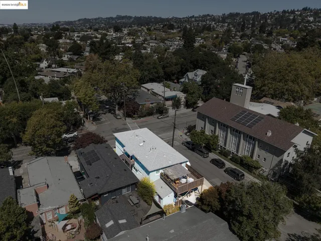 an aerial view of a city with lots of residential buildings