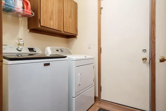 a utility room with dryer and washer
