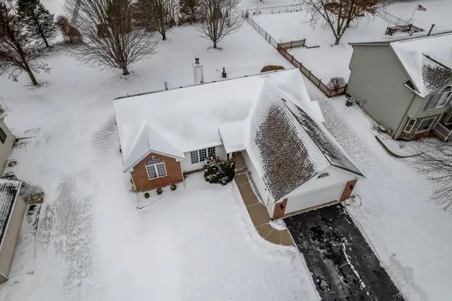 a view of a house with a street