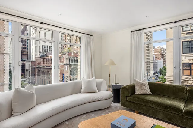 a black and white photo of a living room