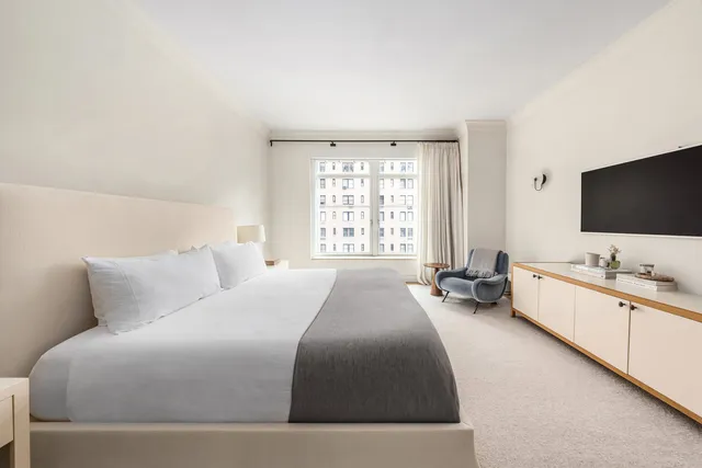 a kitchen with stainless steel appliances a stove a sink and a microwave