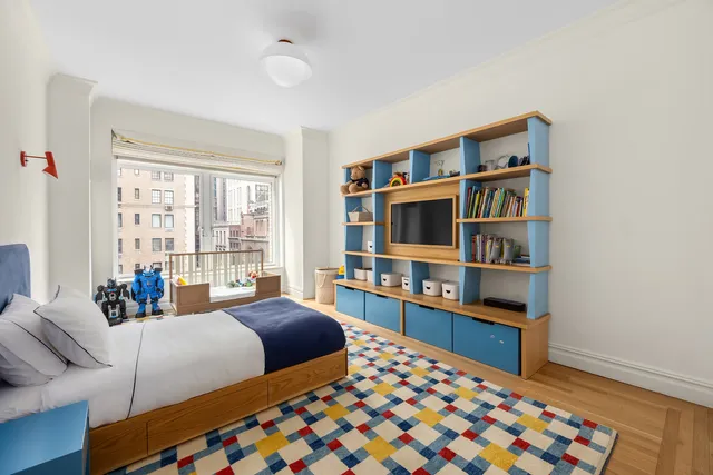a bathroom with a double vanity sink mirror and shower
