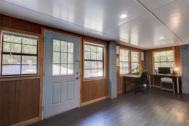 a view of a livingroom with furniture wooden floor and furniture