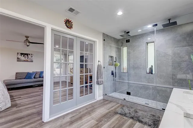 wooden floor with windows and city view