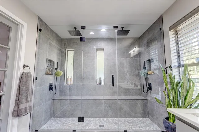 a bathroom with a mirror