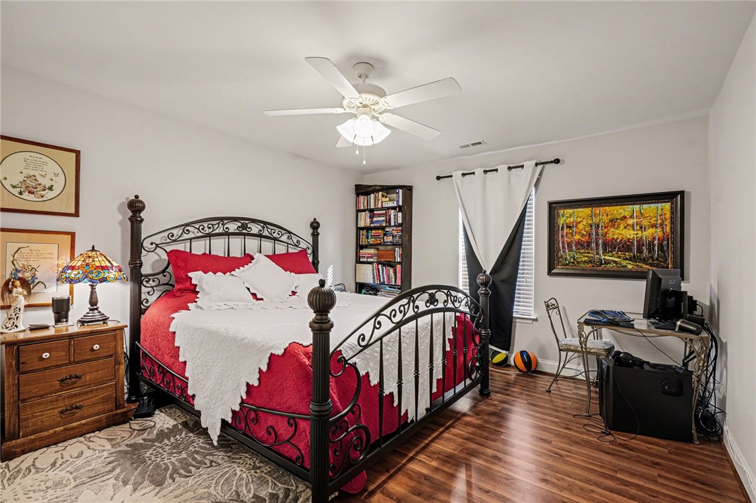 125 Apple Grove Drive Inman, SC 29349 - Photo 11 of 19 This spacious bedroom offers ample natural light and comfortable living.