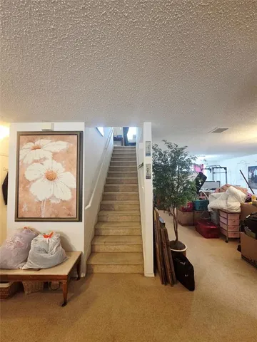 a view of a livingroom with furniture and toys