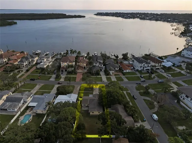 a view of lake and houses with outdoor space