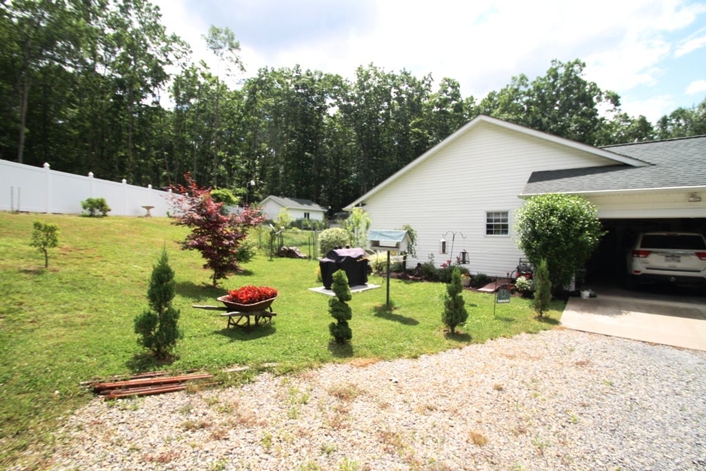 275 G Henson Road Crawley, WV 24931 - Photo 8 of 29 side view with garage