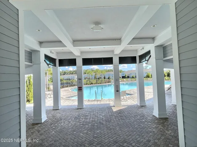 a view of an entryway with front door