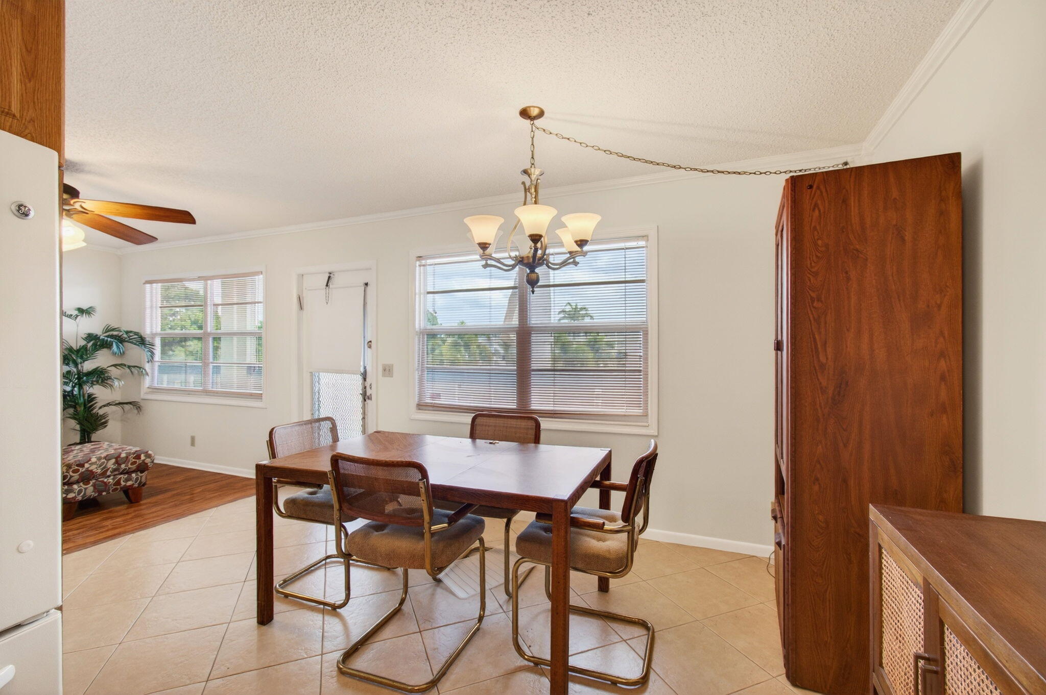 3007 Yarmouth C Boca Raton, FL 33434 - Photo 16 of 70 a view of a dining room with furniture window and outside view
