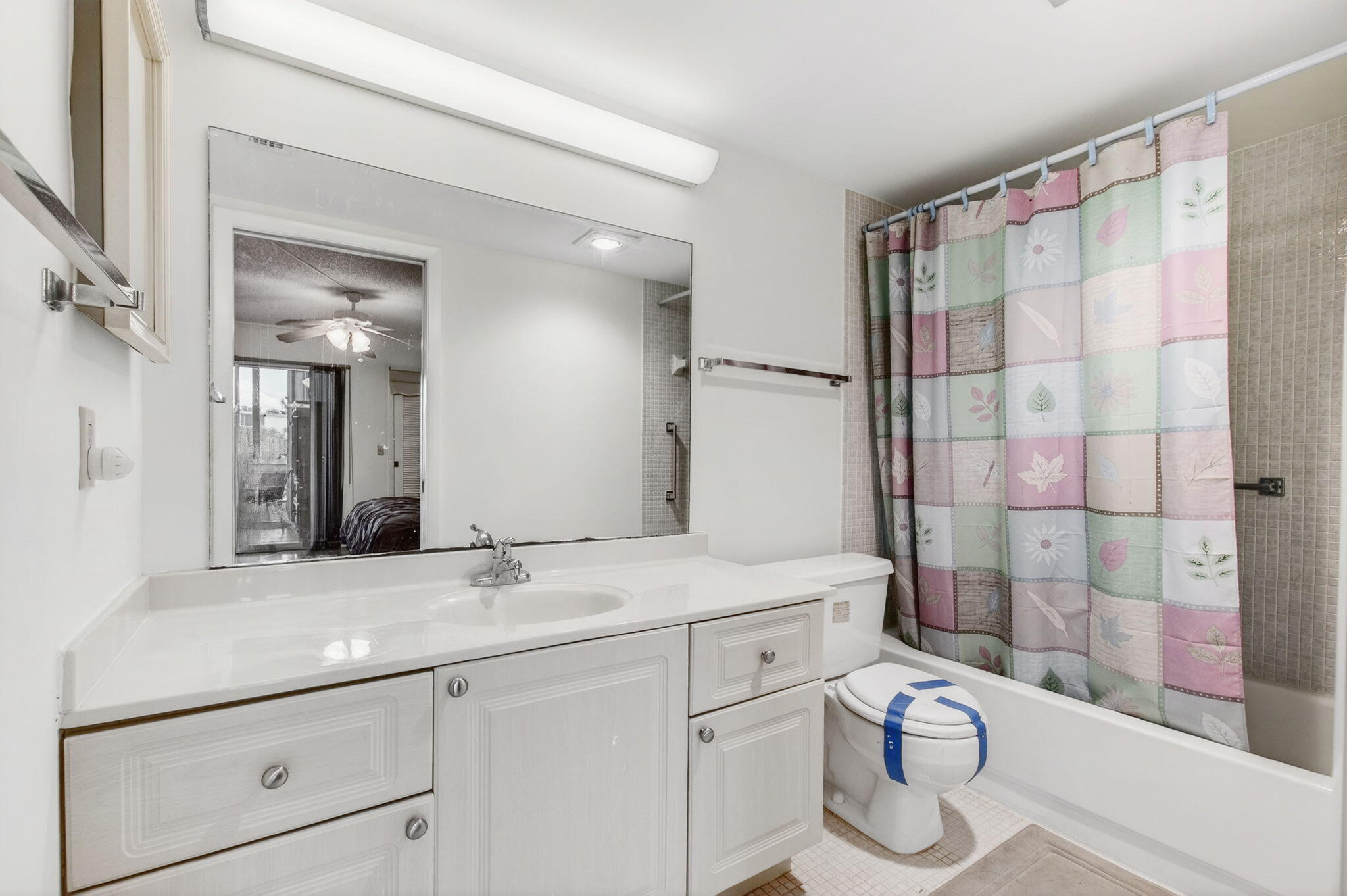 3007 Yarmouth C Boca Raton, FL 33434 - Photo 22 of 70 a bathroom with a sink a toilet and shower