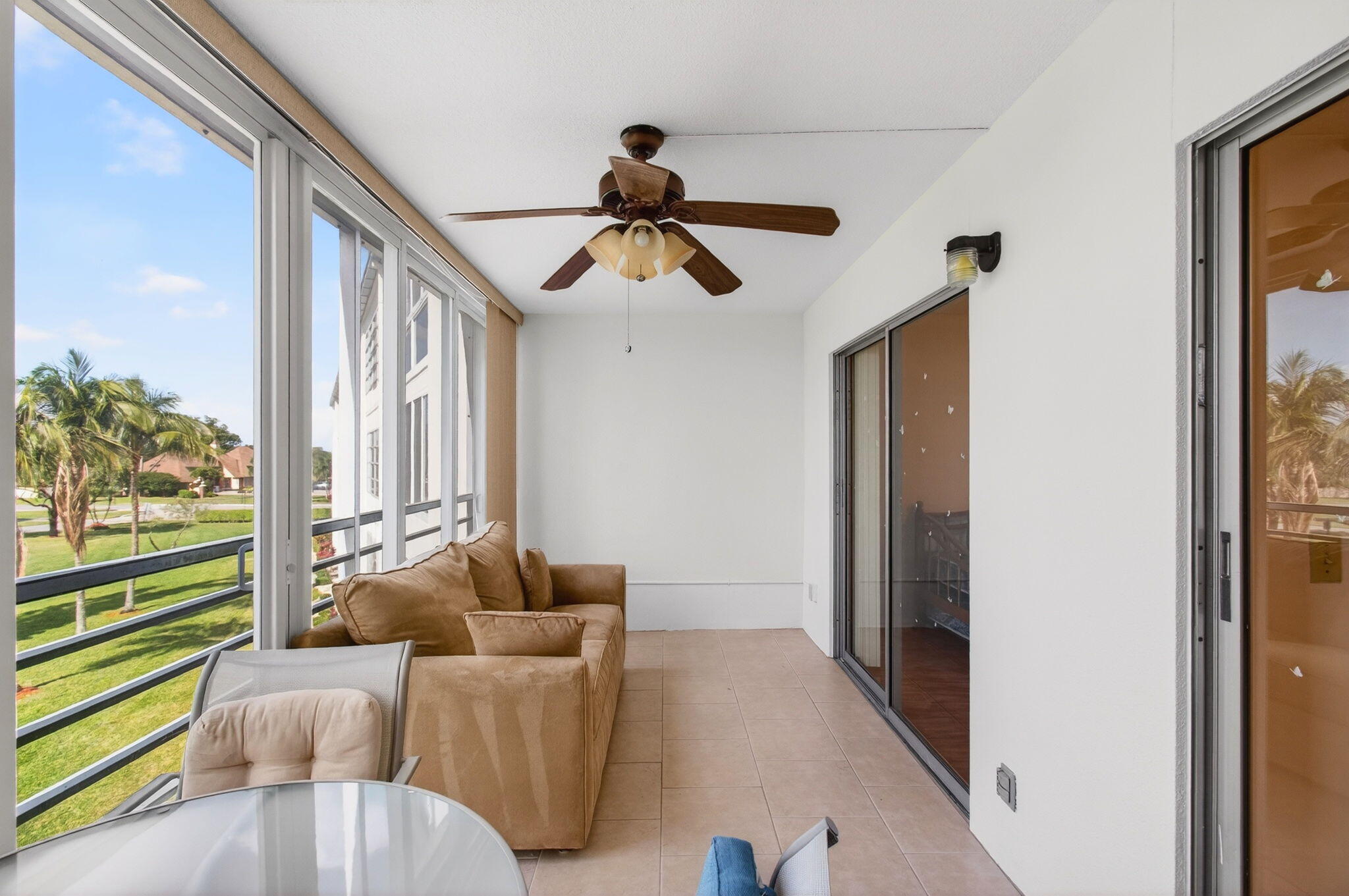 3007 Yarmouth C Boca Raton, FL 33434 - Photo 36 of 70 a living room with furniture and a flat screen tv