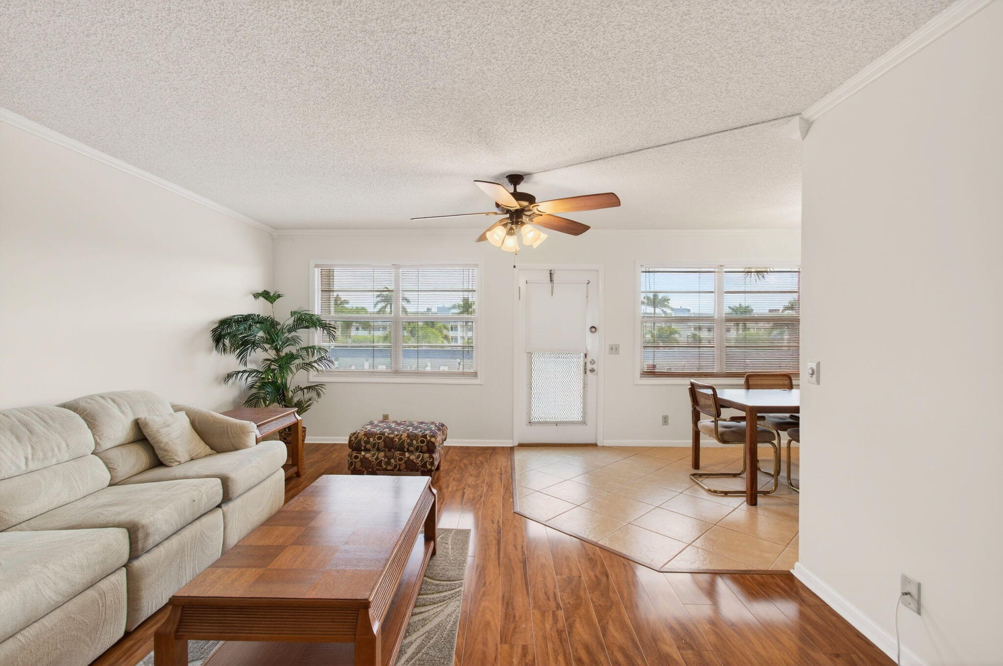 3007 Yarmouth C Boca Raton, FL 33434 - Photo 4 of 70 a living room with furniture and a chandelier