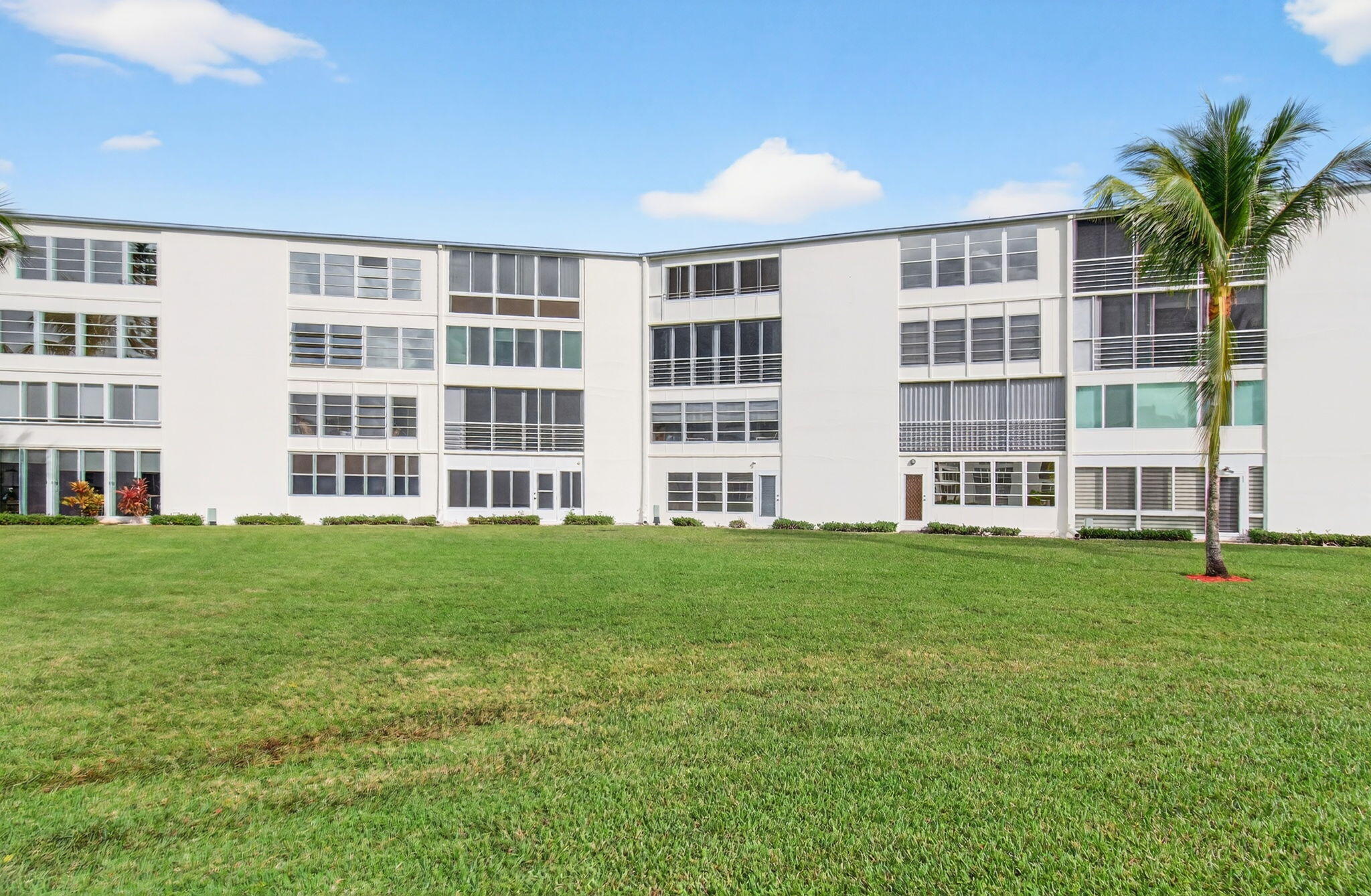 3007 Yarmouth C Boca Raton, FL 33434 - Photo 43 of 70 a view of building with yard