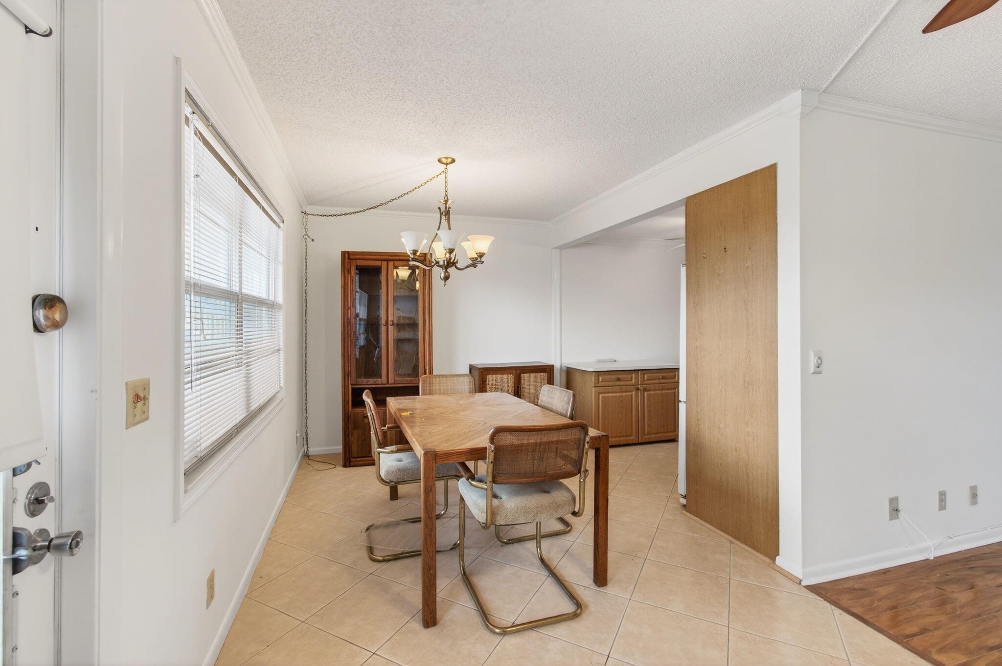 3007 Yarmouth C Boca Raton, FL 33434 - Photo 9 of 70 a view of a dining room with furniture and window