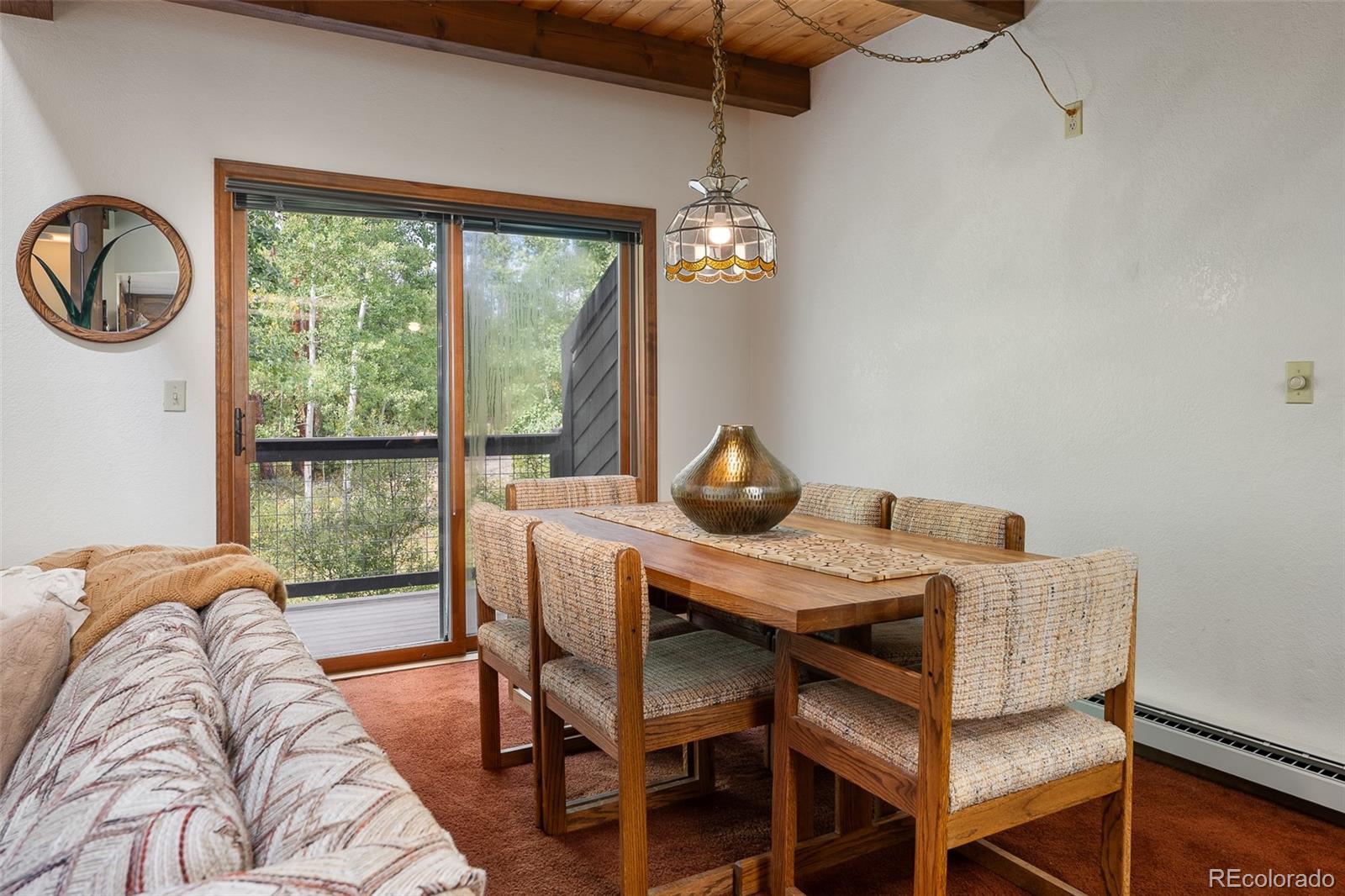 300 Kings Crossing Road, Unit B3 Winter Park, CO 80482 - Photo 14 of 38 a view of a dining room with furniture window and outside view