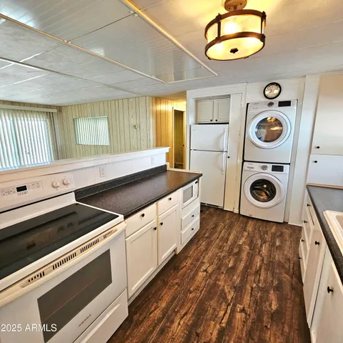 a kitchen with a stove and a sink