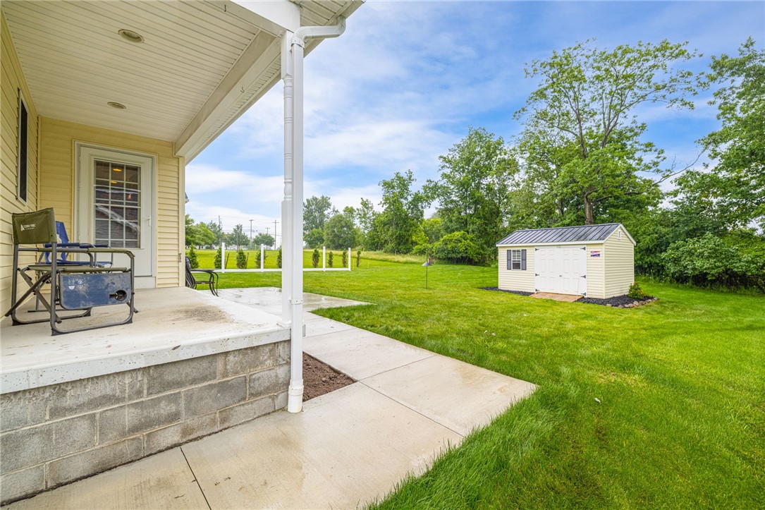 86 Parnell Drive Riga, NY 14428 - Photo 26 of 30 Brand New sidewalk leading from driveway to rear B
