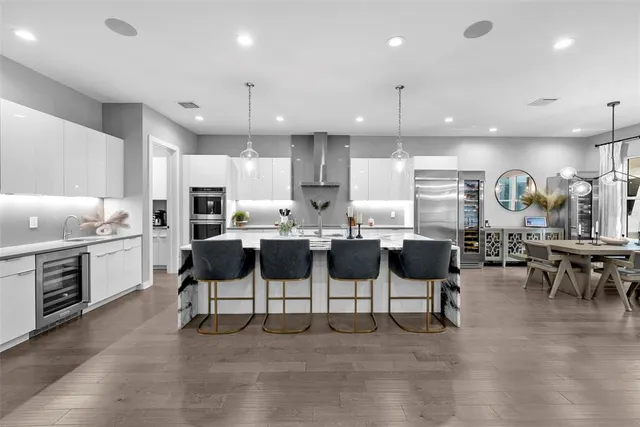 a spacious bedroom with a bed and a couch