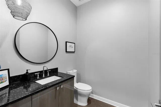 a view of a swimming pool with sitting area