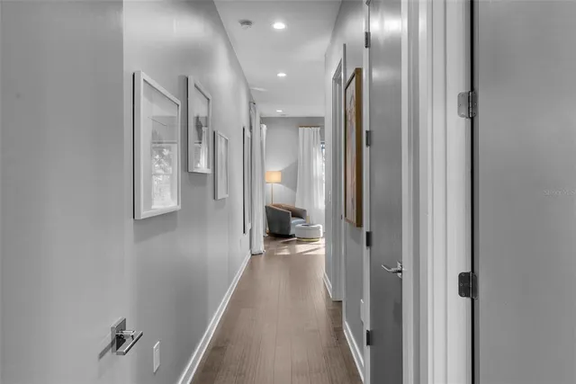 a kitchen with a stove a sink and a microwave