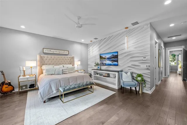 a bathroom with a double vanity sink toilet and shower