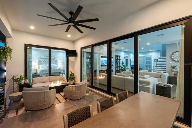 a view of a swimming pool with a patio