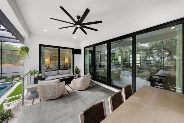 a view of a backyard with a tree