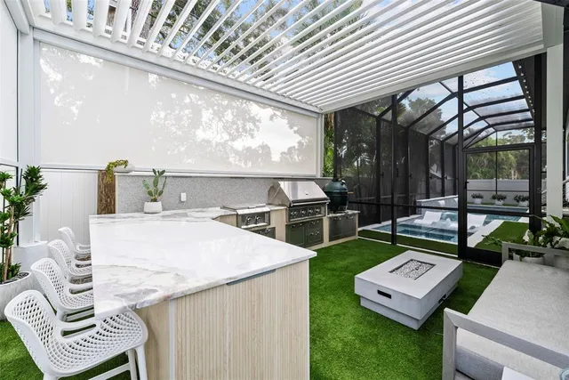 a front view of a house with a garden and trees