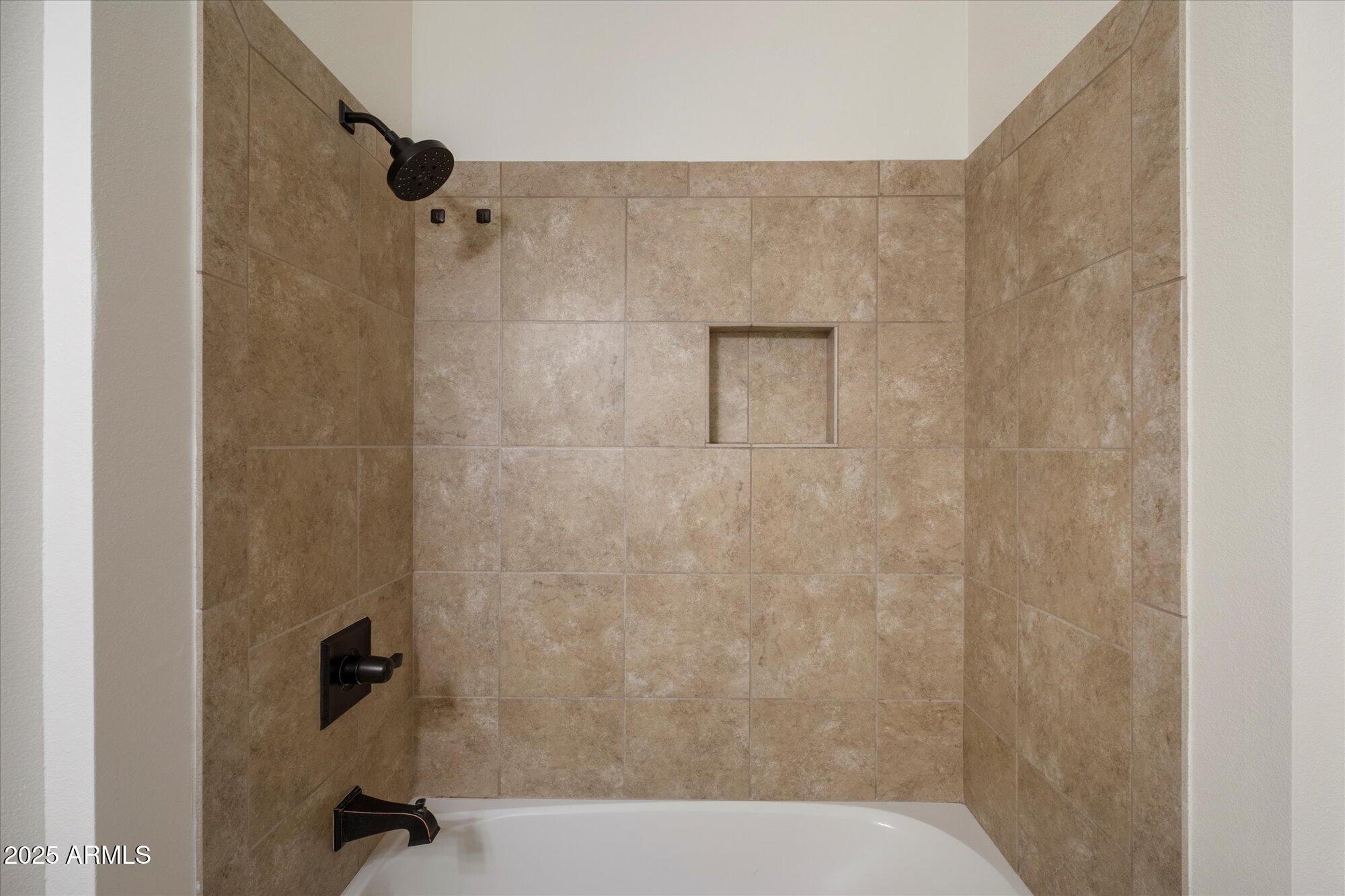 2511 West Queen Creek Road, Unit 230 Chandler, AZ 85248 - Photo 16 of 37 a bathroom with a shower