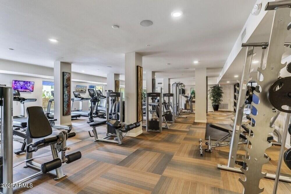 2511 West Queen Creek Road, Unit 230 Chandler, AZ 85248 - Photo 25 of 37 a view of a room with gym equipment
