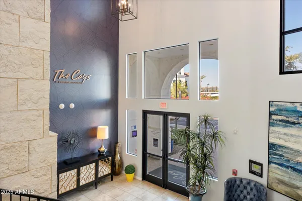 a view of an entryway with a workspace