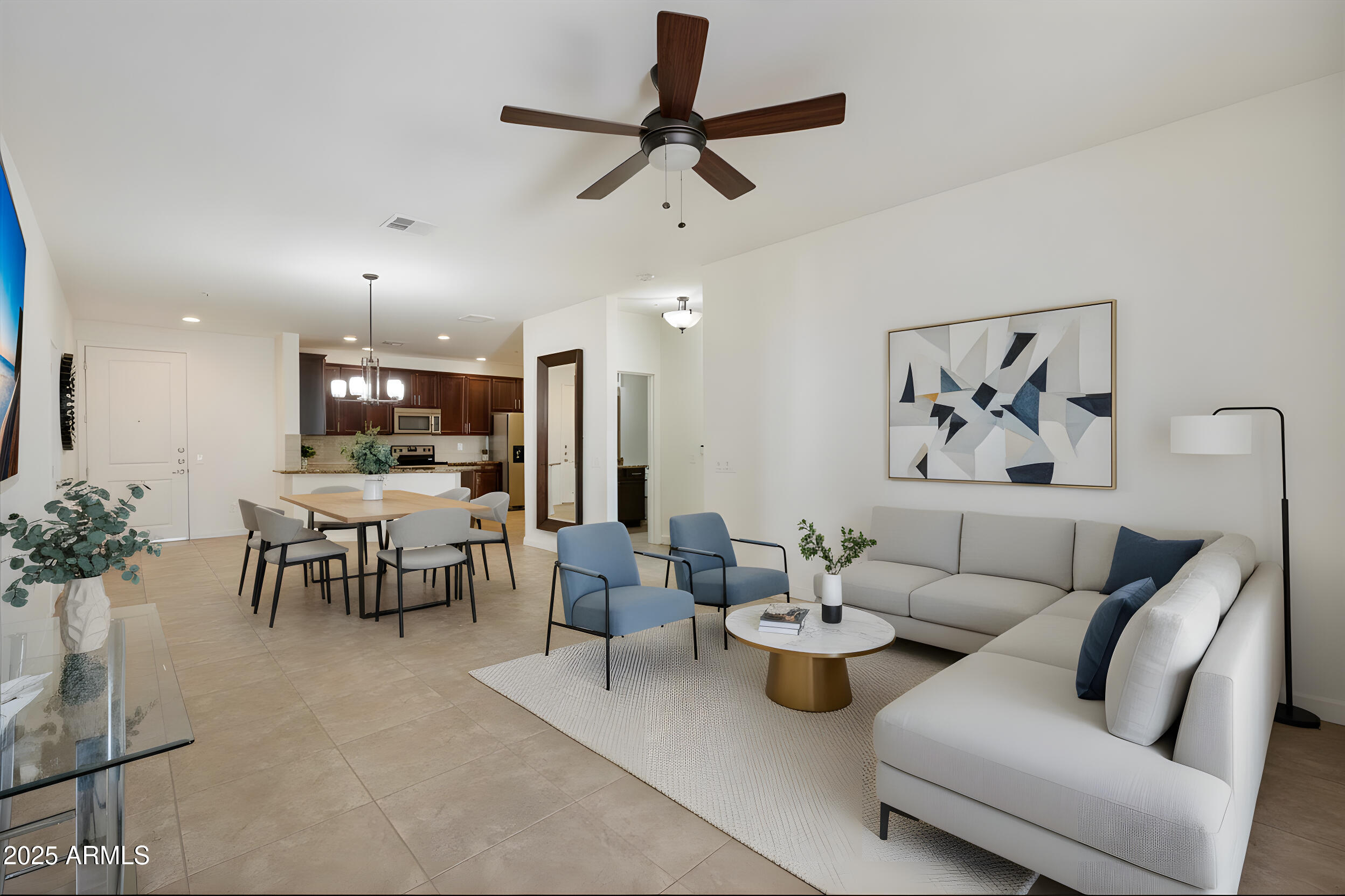 2511 West Queen Creek Road, Unit 230 Chandler, AZ 85248 - Photo 3 of 37 a living room with furniture and a flat screen tv