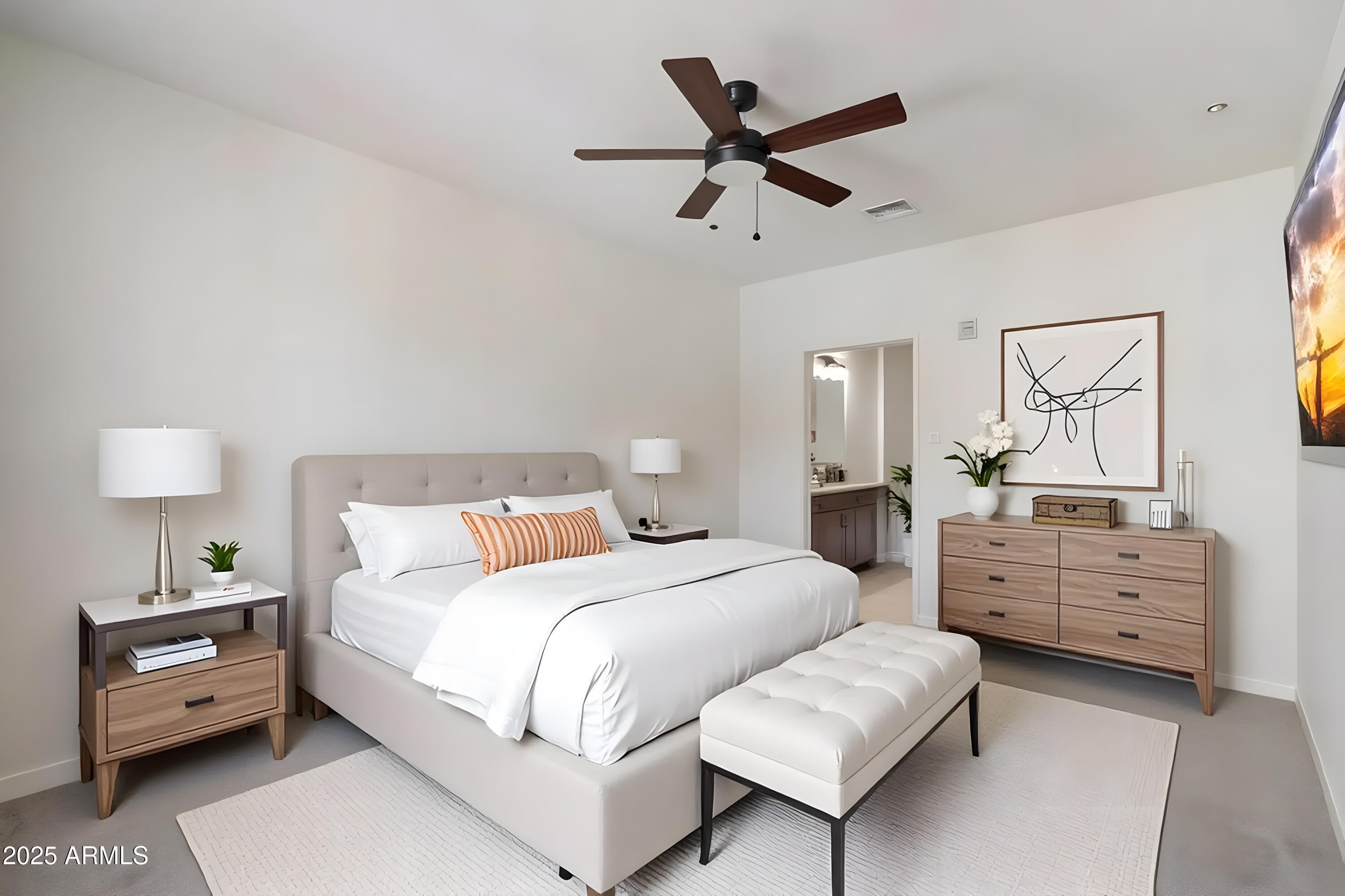 2511 West Queen Creek Road, Unit 230 Chandler, AZ 85248 - Photo 6 of 37 a bedroom with a bed and a chandelier