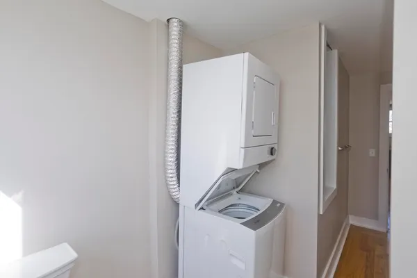 a view of staircase with white walls