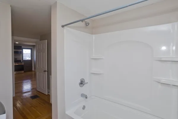 a bathroom with a bathtub