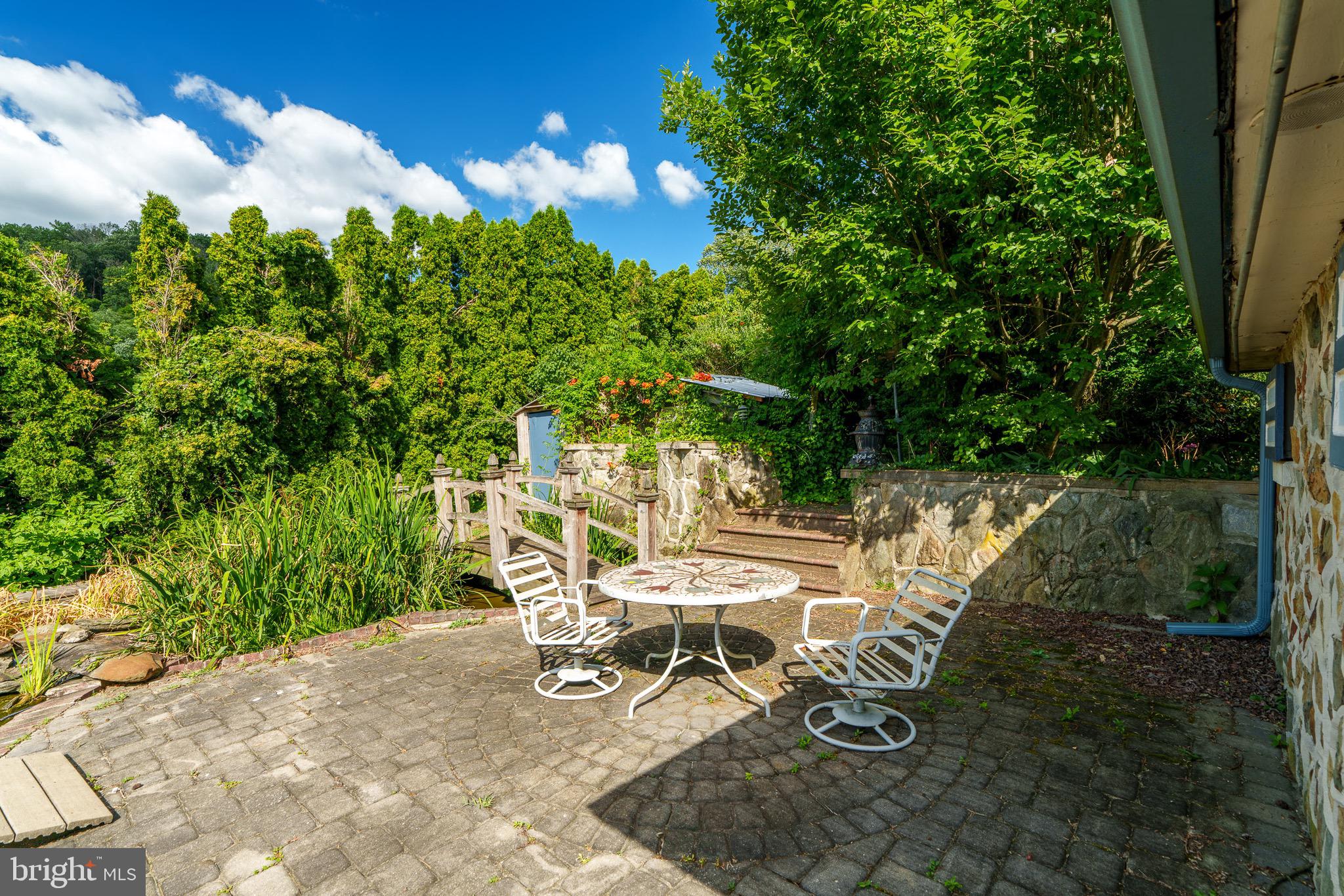 701 Bridge Valley Road Pequea, PA 17565 - Photo 73 of 91 a view of a backyard with sitting area