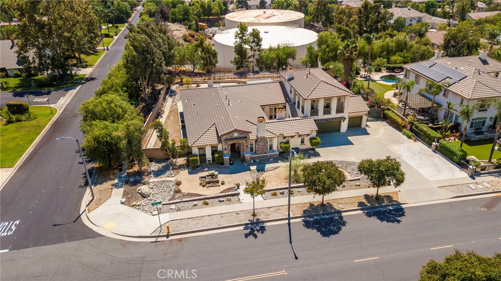 10281 Hillside Road Rancho Cucamonga, CA 91737 - Photo 2 of 60 an aerial view of a house with swimming pool and outdoor seating